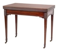 An Edwardian mahogany triple top folding games table:,