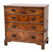 An 18th Century walnut and crossbanded rectangular chest:, the top with a moulded edge,