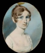 English School Circa 1800- A miniature portrait of a young lady, head and shoulders,