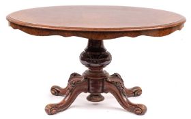 A Victorian walnut oval breakfast table:,