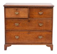 An early 19th Century oak rectangular chest:, the top with a moulded edge,