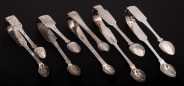 Four Irish and one English silver pairs of sugar tongs,