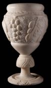 A late Victorian alabaster table lamp: of ovoid outline with low relief decoration of grapes and