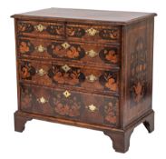 An early 18th Century walnut, banded and floral marquetry rectangular chest:,