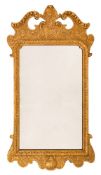 An 18th Century carved giltwood and gesso wall mirror:,