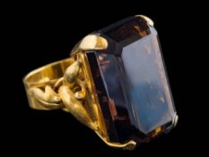A rectangular smoky quartz,