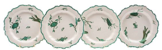 A set of four Wedgwood feather edged creamware plates: transfer printed and painted in green