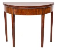 An early 19th Century mahogany and inlaid half round tea table: with a hinged top and boxwood