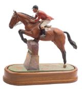 A Royal Worcester Limited Edition equestrian figure of 'Foxhunter and Lt. Col. H.M.Llewellyn C.B.E.