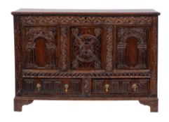 An early 18th Century carved oak rectangular dower chest:,