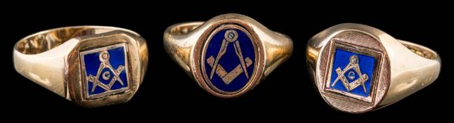 Three 9ct gold and blue enamelled Masonic swivel rings: approximately 18gms gross weight.