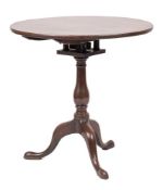 A George III mahogany circular tea table:,