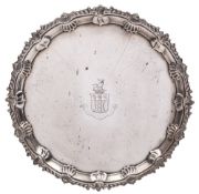 An Edward VII silver salver, maker Josiah Williams & Co, London, 1901: crested, of circular outline,