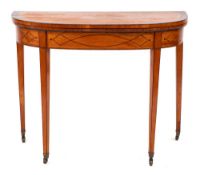 An early 19th Century satinwood and inlaid card table: of D-shaped outline bordered with boxwood