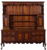 A late 18th Century oak, mahogany crossbanded and chequer inlaid dresser:,