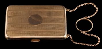 A 9ct gold rectangular cigarette case: with elastic retainer and on chain with carrying ring,
