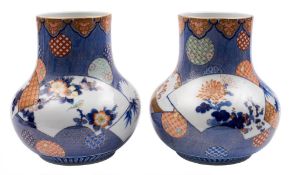 A pair of Japanese Fukugawa vases: of compressed globular form,