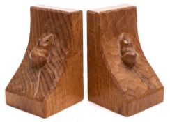 A pair of Robert 'Mouseman' Thompson carved oak book ends: of traditional design decorated with