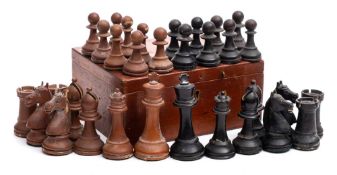 A Staunton pattern competition weighted chess set: one side ebonised the other in boxwood,