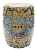 A Chinese famille rose barrel-shaped garden seat: enamelled overall with sinuous dragons chasing