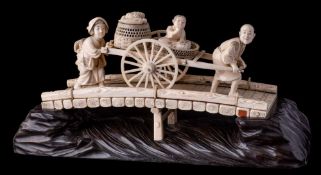 A large Japanese carved ivory okimono,