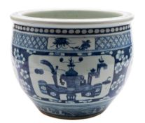 A Chinese blue and white jardiniere: painted with panels of auspicious objects on a prunus ground