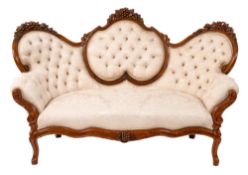 A 19th Century Continental carved beech settee:,