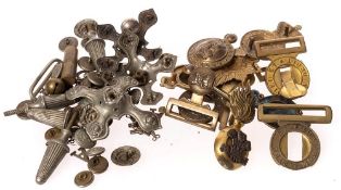 A collection of minor badges, belt buckles, etc.: (a lot).