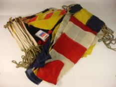 A full set of signalling flags: together with a set of explanatory cards,