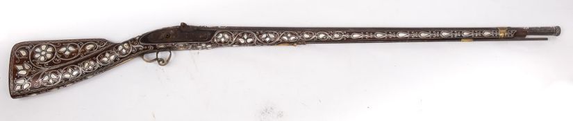 A 19th century Turkish white metal and mother of pearl inlaid percussion cap rifle: the 35 inch