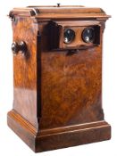 A Victorian Walnut tabletop stereoscope viewer: unsigned, the arched moulded top with mirror,