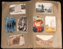 An early 20th century postcard album: mostly GB topographical cards and some humour etc,