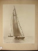 A monochrome photograph of 'Cutty 1920' by Kirk of Cowes:, framed and glazed, 28 x 23cm .