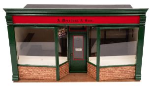A wooden scale model of green grocers 'A Merchant & Son': with green glazed double fronted window