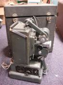 A Pailliard Bolex Model G916 projector in case: