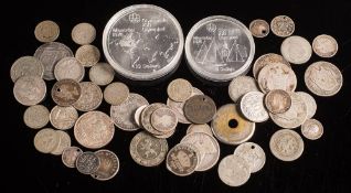 A group of silver world coins including Canada ten dollar and five dollar pieces,