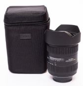 A Sigma 512-24mm f4.5-5.6 II DG lens in original box and bag.