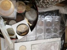 A large collection of coins in tins, bags etc plus banknotes.