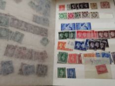 A box of stamps including GB.