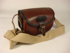 A Parker-Hale leather cartridge bag:, 'CB 75-S' pattern.
