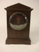 A WWII RAF ward room mantel clock: the single fusee movement with Arabic numeral dial marked with