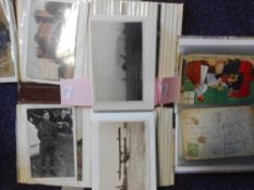 A collection of Edwardian and later postcards: relating to military and militaria contained in