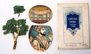 Two late 19th century Indian oval miniatures: one of a palace interior,
