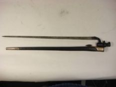 An 1876 pattern Martini Henry bayonet: with War Department stamps to ricasso,