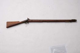 A 19th century-style percussion cap musket: the 36 inch barrel with steel ramrod beneath,