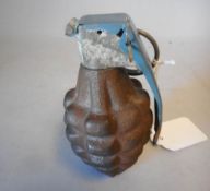 A British army practice grenade:12cm high.