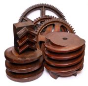 A group of six foundry wooden templates,: comprising of three cog gears,