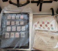A suitcase of stamps on pages etc including old.