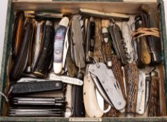 A collection of various knives and penknives including a WWII issue Royal Navy Clasp knife,
