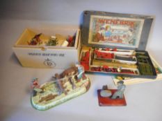 J Wagner, Nurnberger, a post war clockwork tinplate toy: of two wood cutters cutting a log,